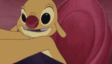 Reuben from 'Lilo and Stitch' eating a sandwich.